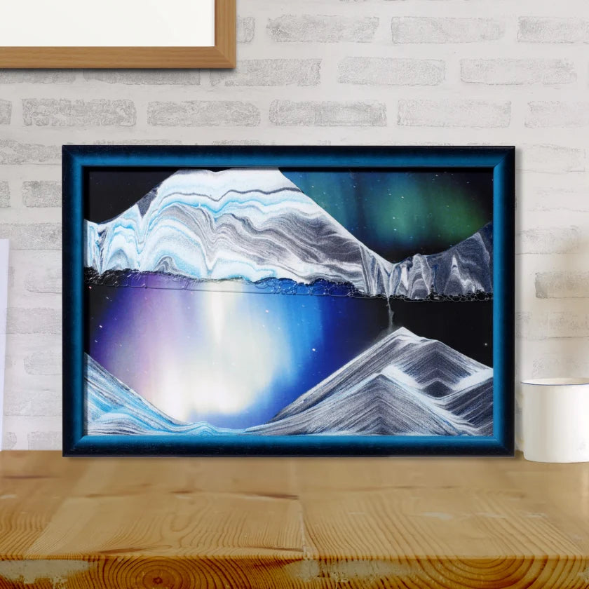 Moving Sand Art with an Aurora Borealis Background and a Rotating Wall Mount for Changing Landscapes