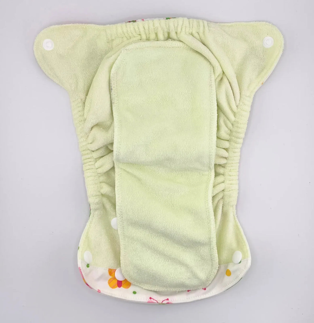 Newborn All-in-One Cloth Diaper with Six-Layer Bamboo Viscose Absorbency and an Umbilical Snap-Down Front