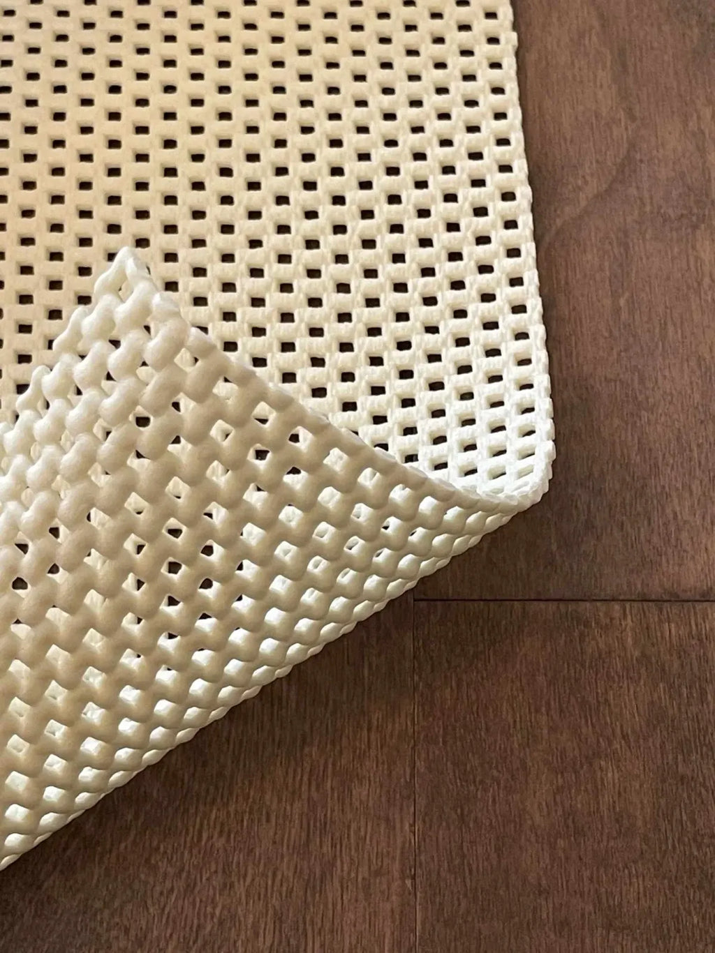 Non-Slip Rug Pad in Cream PVC, 0.16-Inch Thick and Easy to Trim