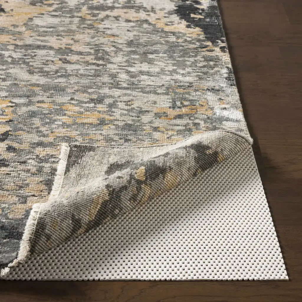 Non-Slip Rug Pad in Cream PVC, 0.16-Inch Thick and Easy to Trim
