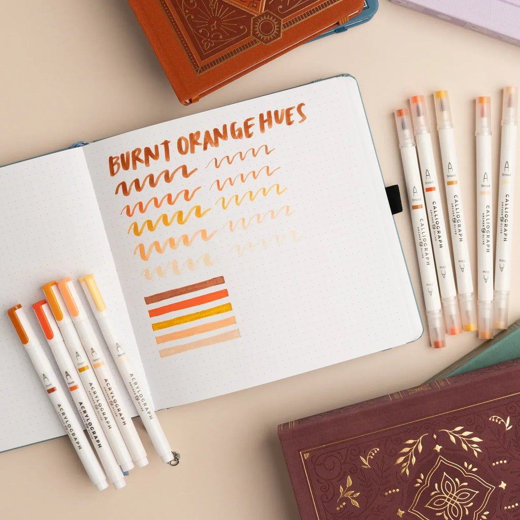 Pen Set in Five Burnt Orange Hues, a Warm Autumn-Inspired Palette for Creative Projects on Paper