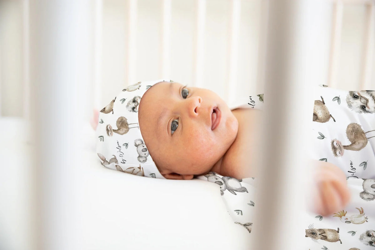 Personalized Baby Swaddle and Beanie Set in Soft Stretch Poly for a Thoughtful Newborn Keepsake