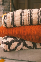Plush Fall Blanket in Rich Harvest Orange for Cozy Snuggling, Made from Soft and Stretchy Fabric