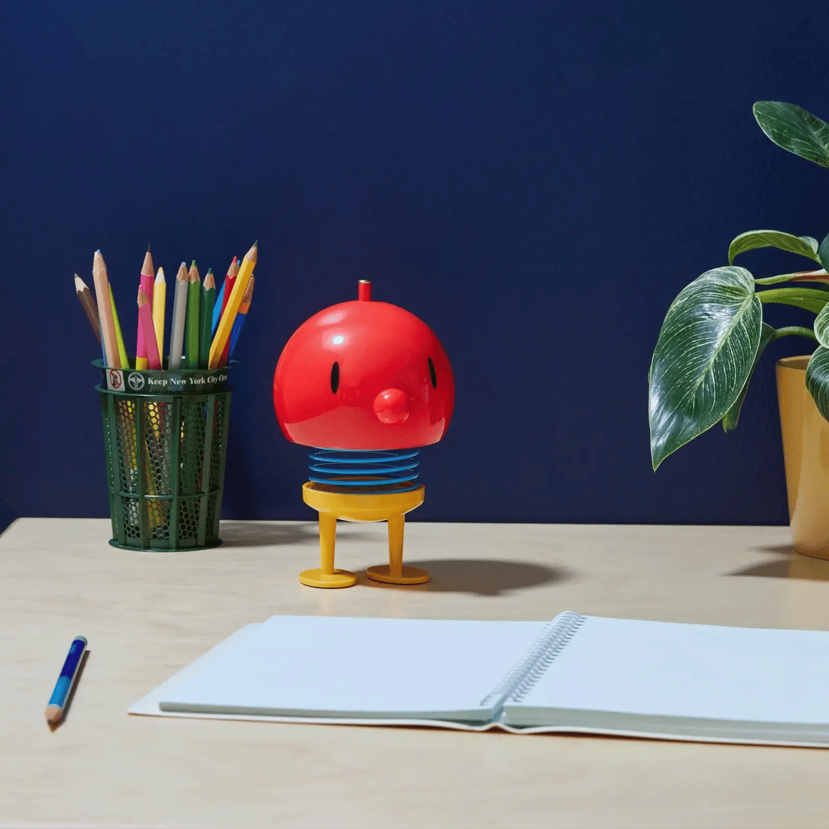 Portable LED Table Lamp in Red and Yellow with Touch Dimming and a Playful Bouncing Spring Body