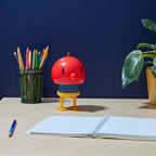 Portable LED Table Lamp in Red and Yellow with Touch Dimming and a Playful Bouncing Spring Body