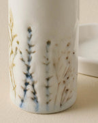 Pressed Floral Ceramic Salt and Pepper Shaker Set with Coordinating Table Tray · salt and pepper shakers