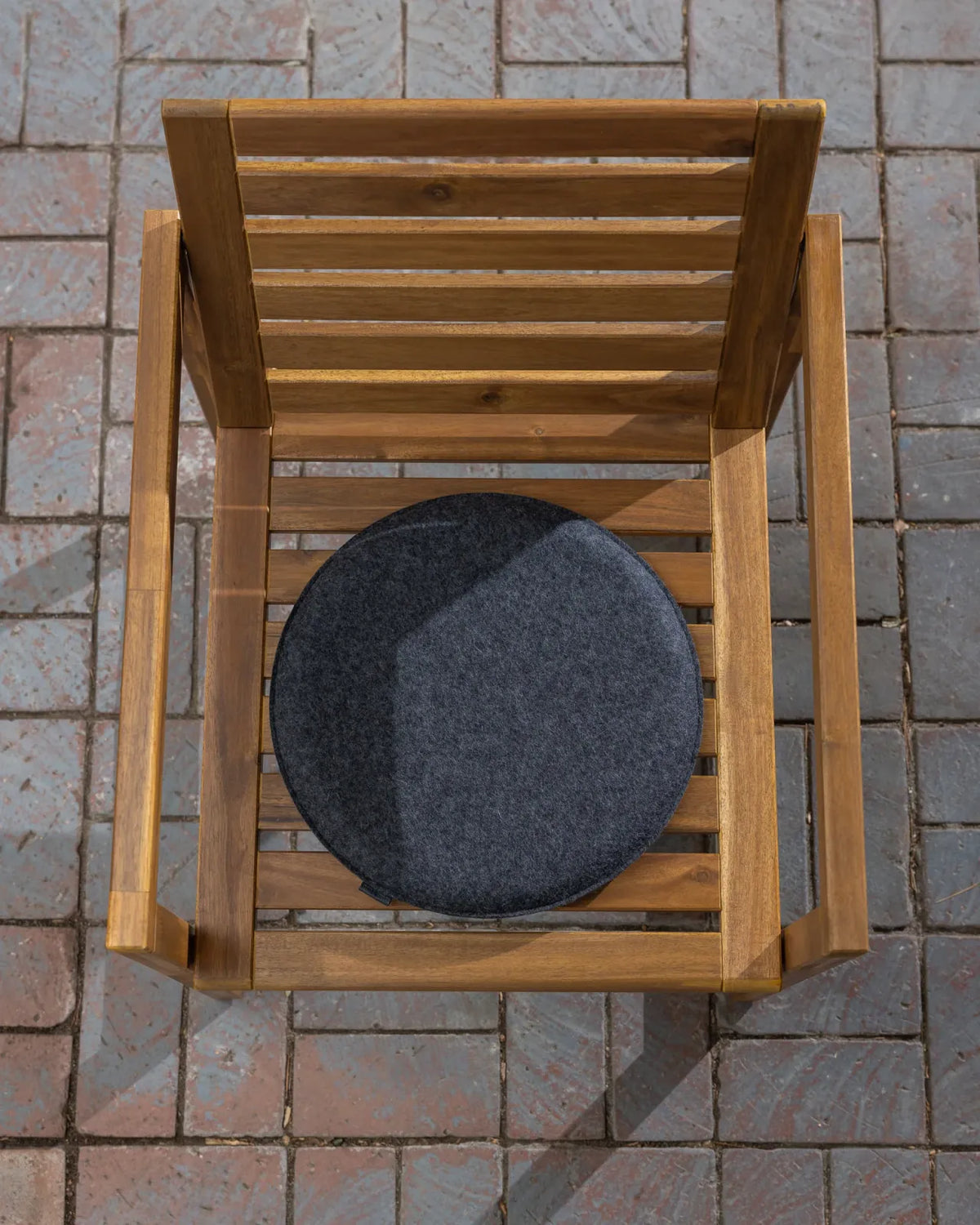 Round Merino Wool Seat Cushion in Charcoal