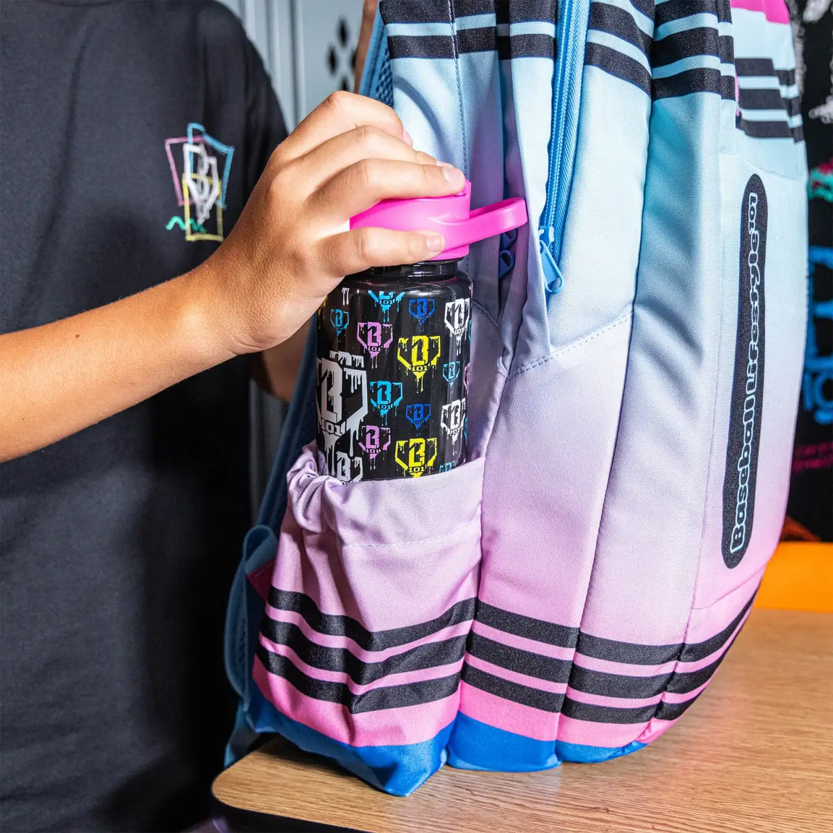 School Backpack in Cotton Candy Gradient with a Padded Laptop Compartment for Class and Game Days