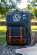 School Backpack in Vintage Blue with an Embroidered University Crest and Dedicated Laptop Compartment