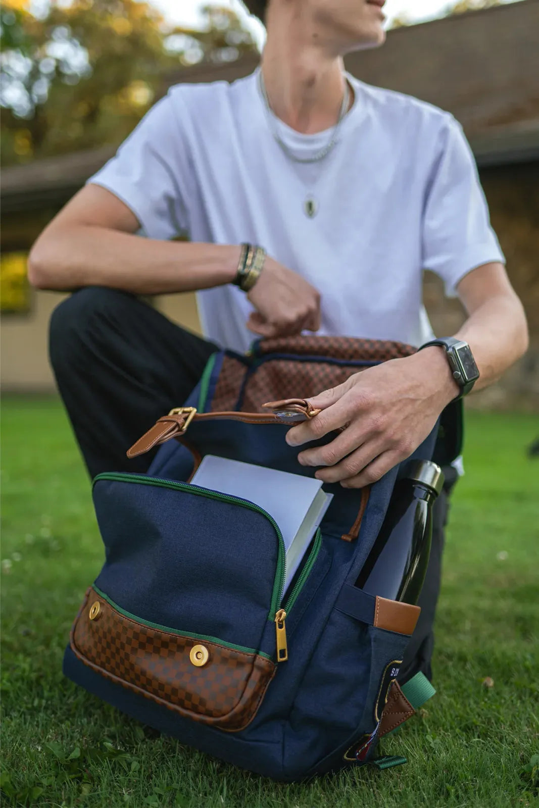 School Backpack in Vintage Blue with an Embroidered University Crest and Dedicated Laptop Compartment