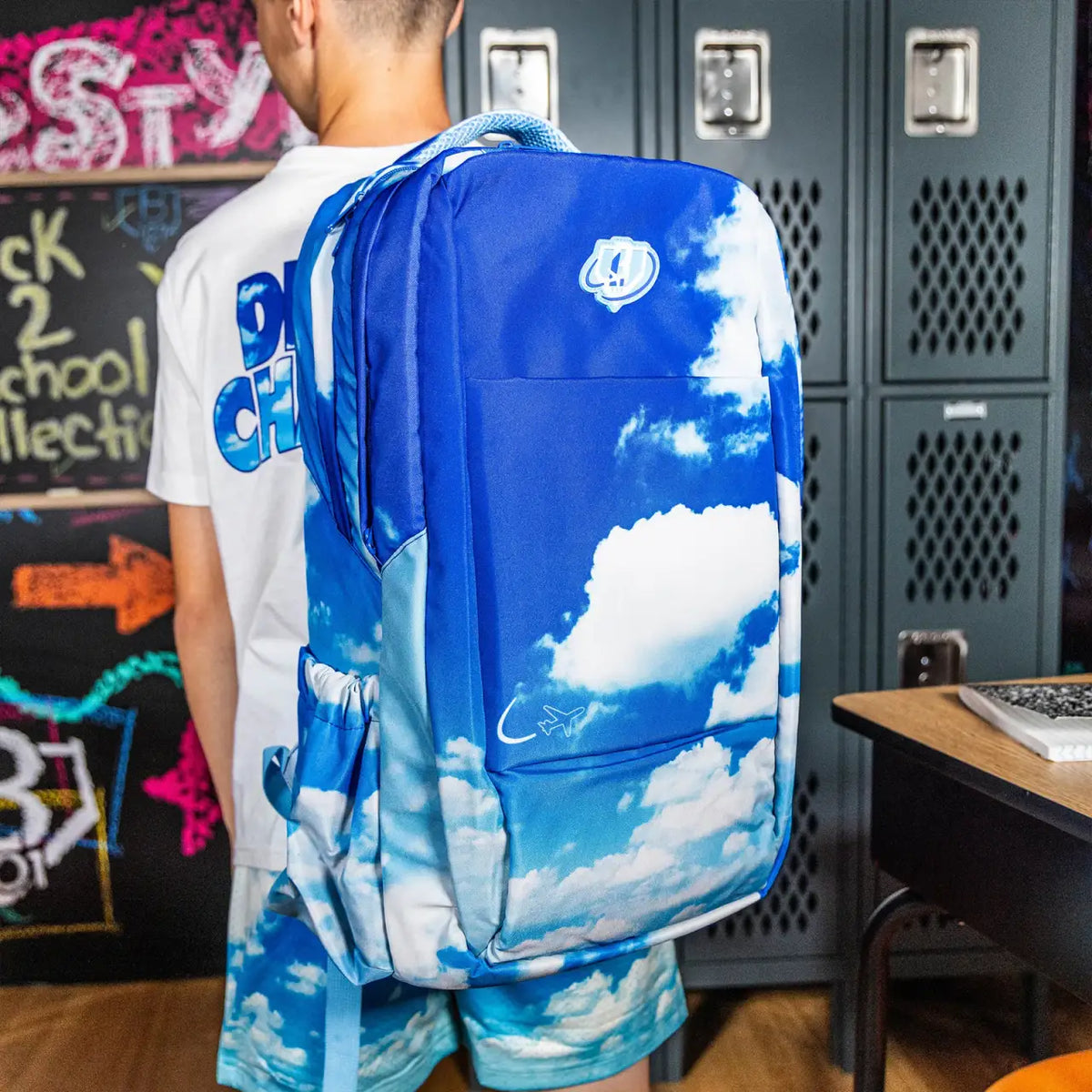 School Backpack with Cloud Print and a Padded Laptop Compartment for Classroom Days and Field Visits
