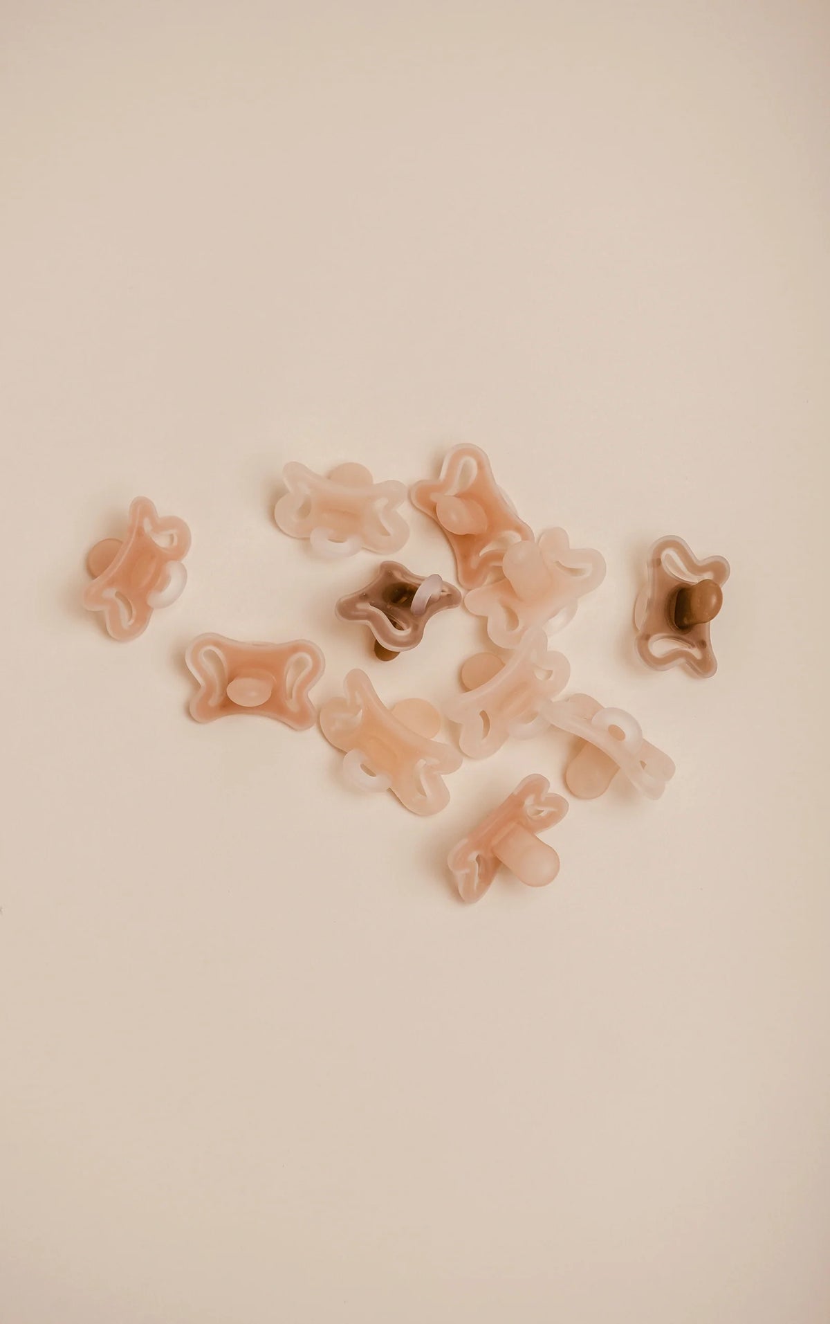 Silicone Baby Pacifier with a Ventilated One-Piece Design for Minimal Contact Against Baby's Skin