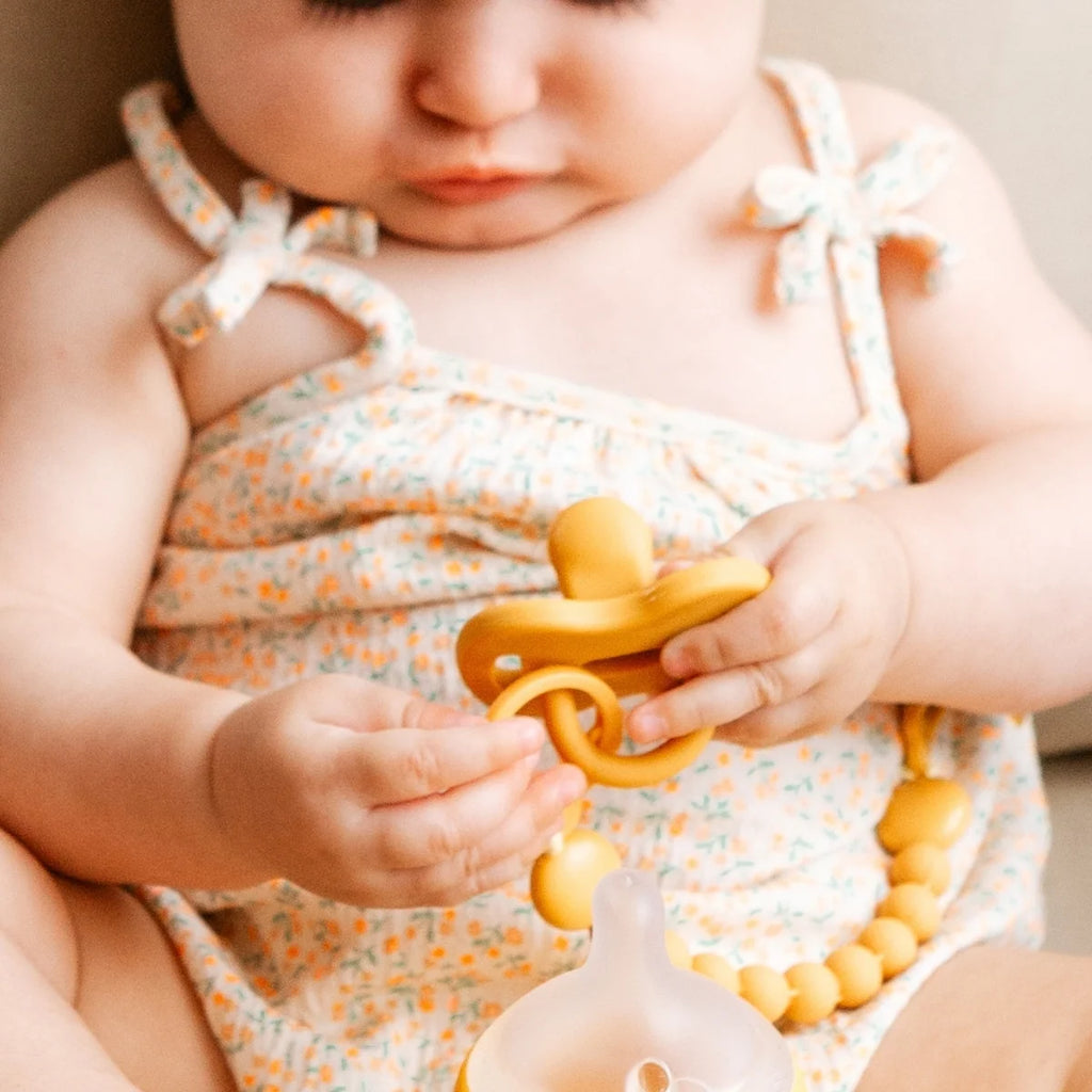Silicone Pacifier 2 Pack with a Reversible Physiological Nipple and Soft Single-Piece Construction