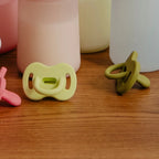 Silicone Pacifier 2 Pack with a Reversible Physiological Nipple and Soft Single-Piece Construction