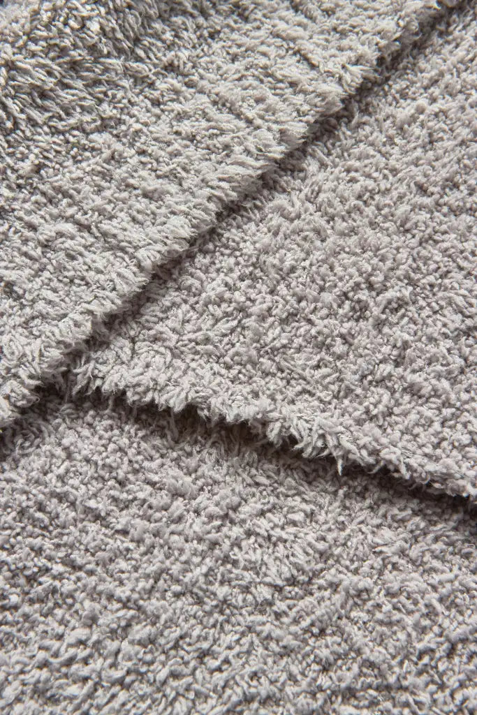 Sofa Blanket in Soft Lightweight Knit with Ribbed Edges for Styling Two-Seater and Three-Seater Sofas