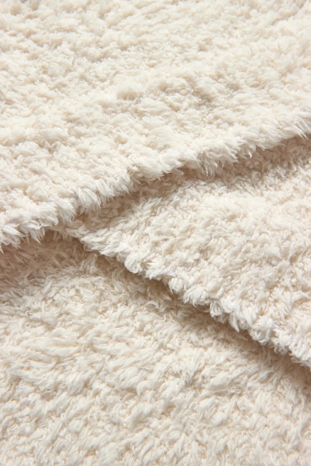 Sofa Blanket in Soft Lightweight Knit with Ribbed Edges for Styling Two-Seater and Three-Seater Sofas