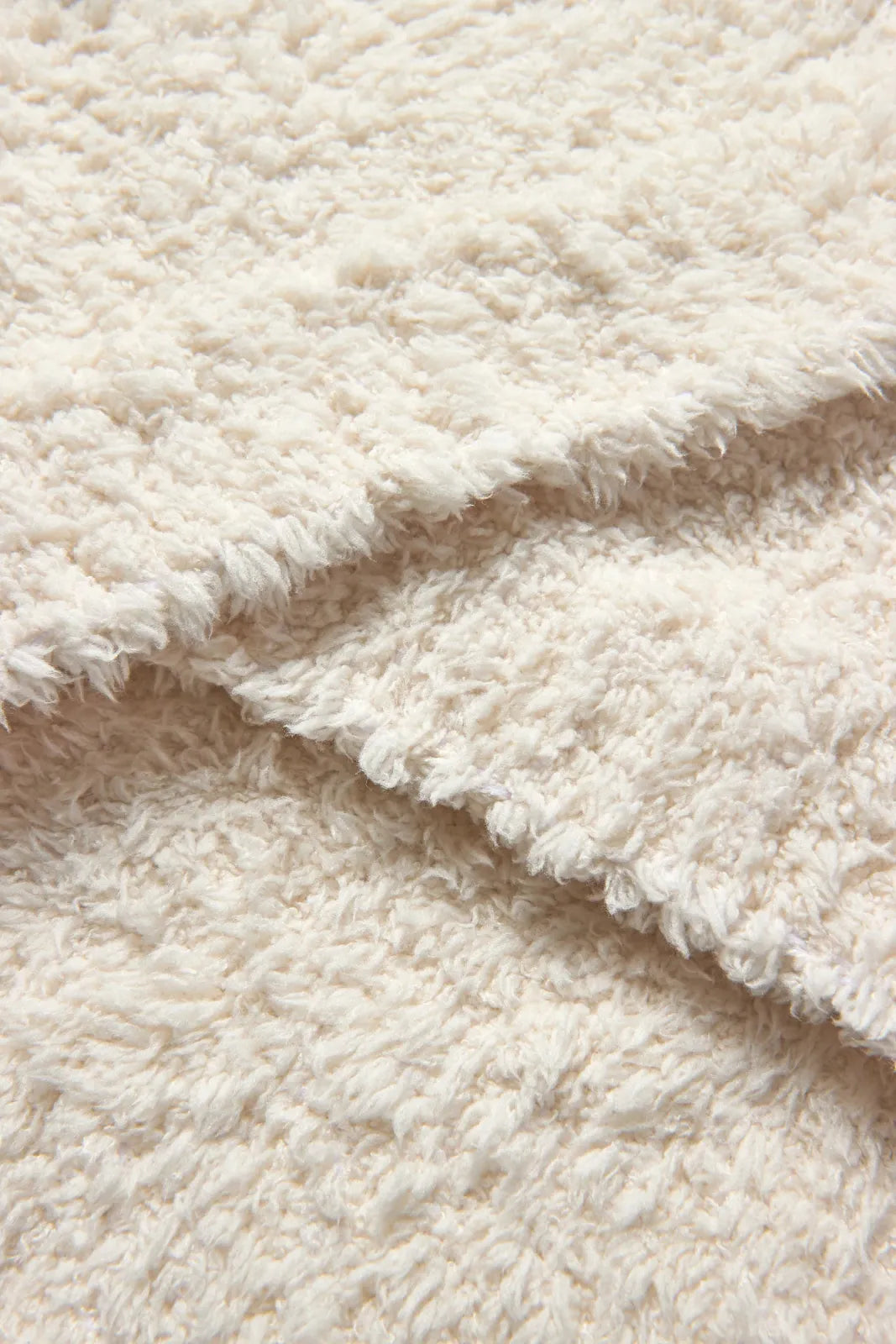 Sofa Blanket in Soft Lightweight Knit with Ribbed Edges for Styling Two-Seater and Three-Seater Sofas