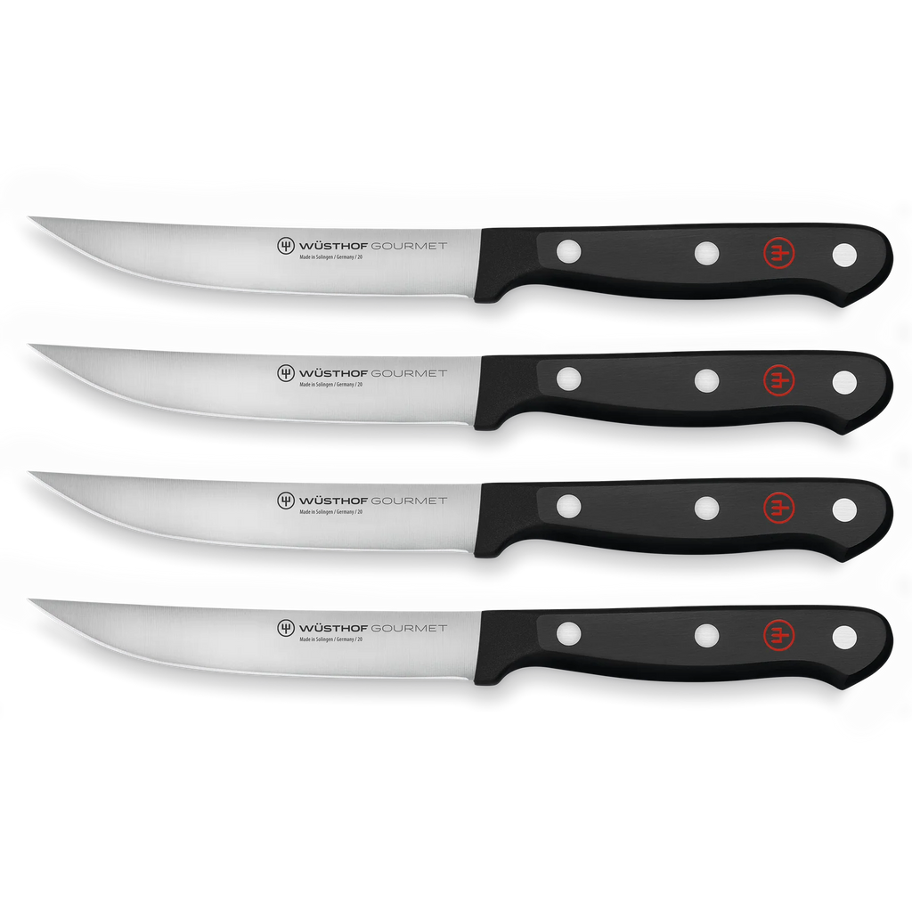 Steak Knife Set with Four Extra-Sharp 4 ½-Inch Knives for Slicing Steaks and Meat Dishes · Four-piece set — Black