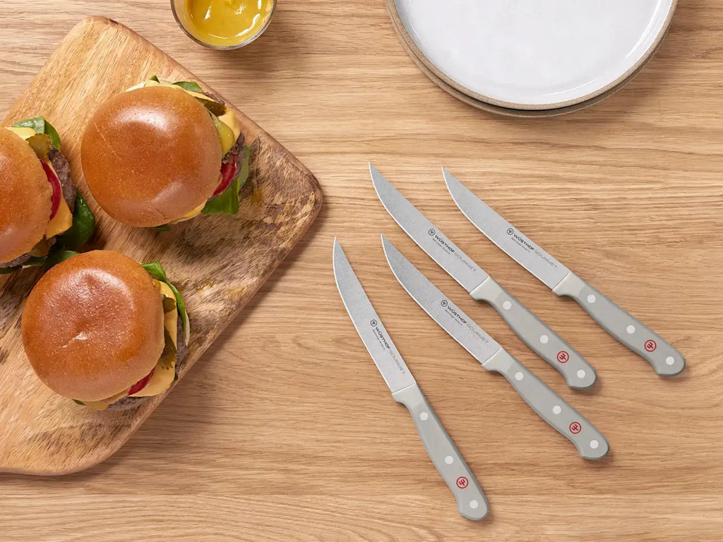 Steak Knife Set with Four Extra-Sharp 4 ½-Inch Knives for Slicing Steaks and Meat Dishes · Four-piece set