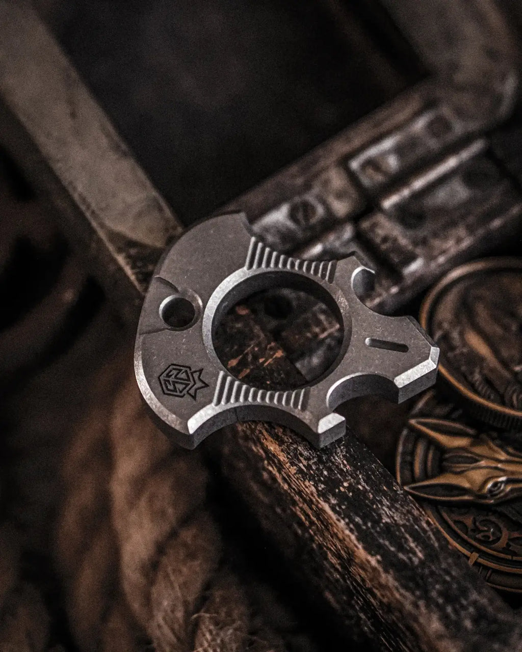 Titanium Bottle Opener Tool with Stonewashed or Elden Edition Finish and Tritium Slots · Machined Grade 5 titanium plate c