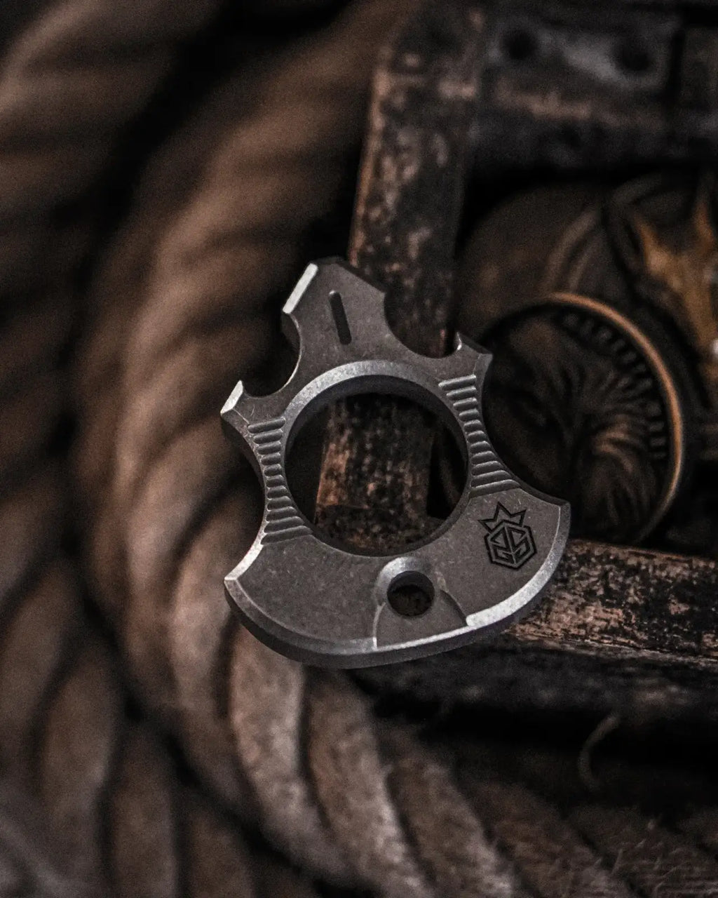 Titanium Bottle Opener Tool with Stonewashed or Elden Edition Finish and Tritium Slots · Machined Grade 5 titanium plate c