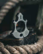 Titanium Bottle Opener Tool with Stonewashed or Elden Edition Finish and Tritium Slots · Machined Grade 5 titanium plate c
