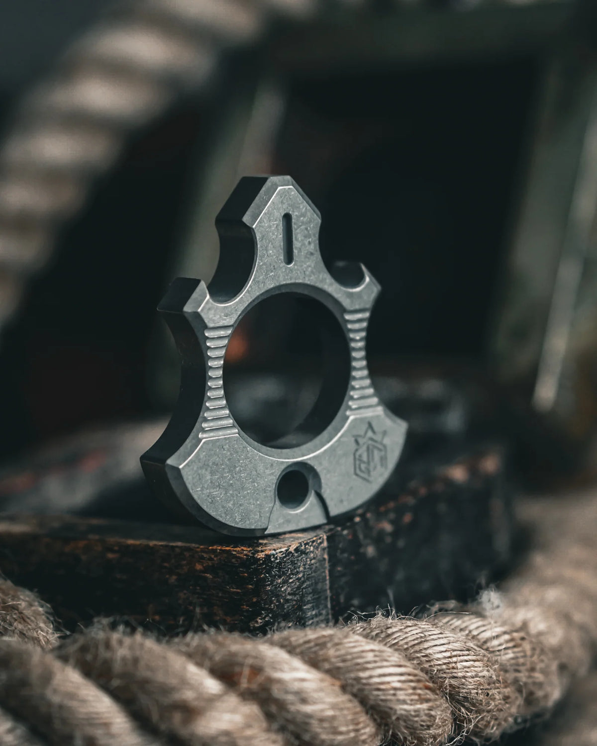 Titanium Bottle Opener Tool with Stonewashed or Elden Edition Finish and Tritium Slots · Machined Grade 5 titanium plate c