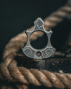 Titanium Bottle Opener Tool with Stonewashed or Elden Edition Finish and Tritium Slots · Machined Grade 5 titanium plate c