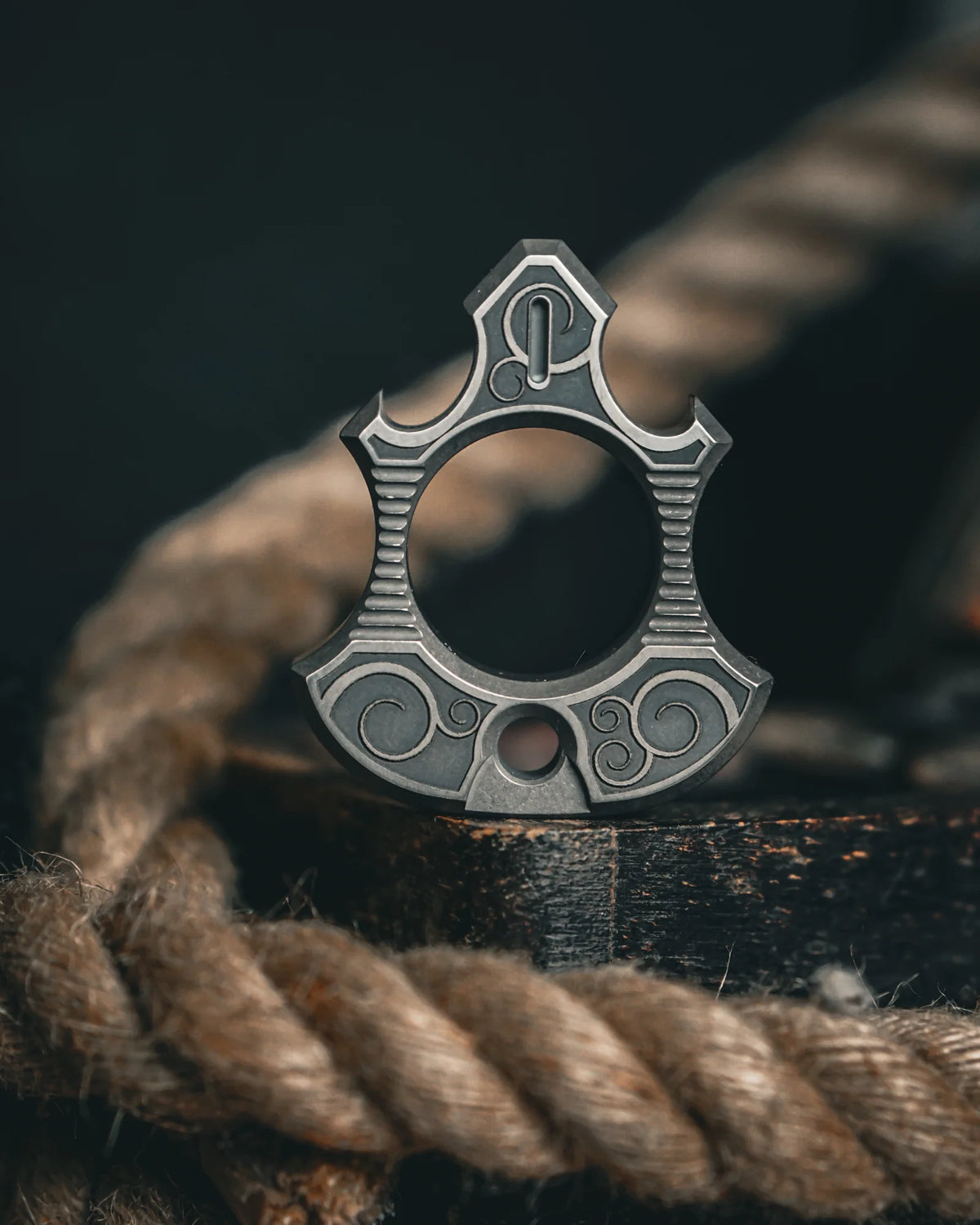 Titanium Bottle Opener Tool with Stonewashed or Elden Edition Finish and Tritium Slots · Machined Grade 5 titanium plate c