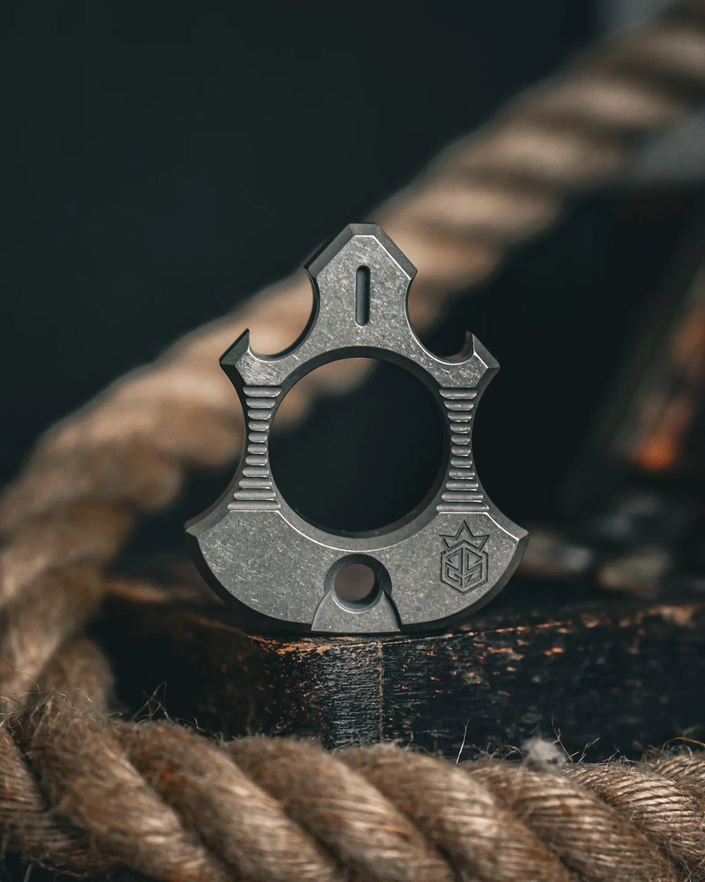 Titanium Bottle Opener Tool with Stonewashed or Elden Edition Finish and Tritium Slots · Machined Grade 5 titanium plate c