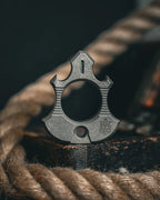 Titanium Bottle Opener Tool with Stonewashed or Elden Edition Finish and Tritium Slots · Machined Grade 5 titanium plate c