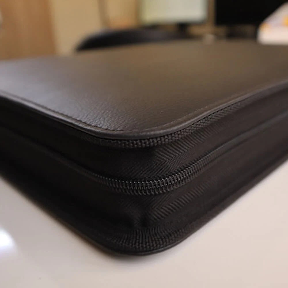 Toploader Binder for 216 Cards in Standard 35pt Holders, Featuring Side-Loading Pages and a Zipper Closure