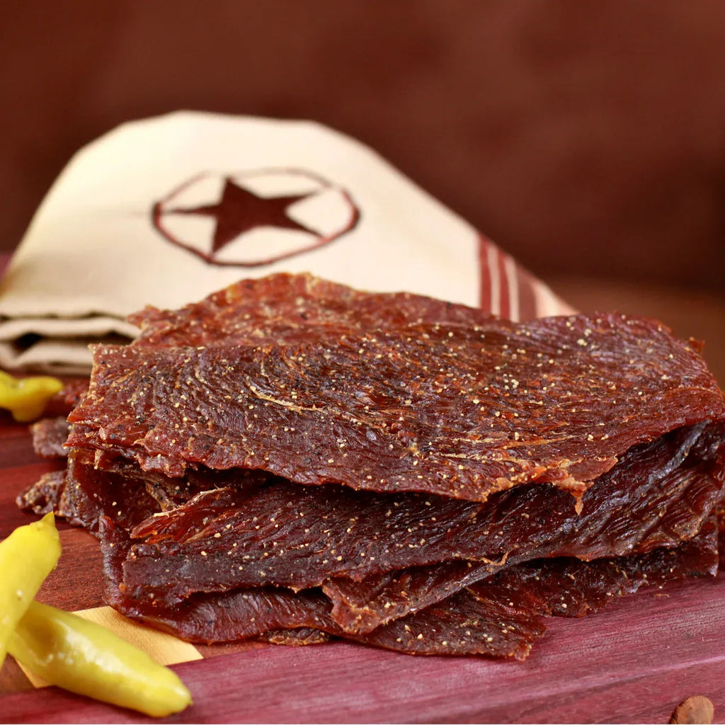 Turkey Jerky Snack, Savory Medium-Moist Slices in 1 lb or 1/4 lb Vacuum-Sealed Packs · Savory turkey jerky