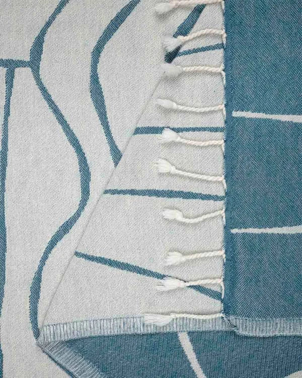 Turkish Organic Cotton Beach Towel with Deep Ocean Shadow Sun Design and Twisted Tassel Trim