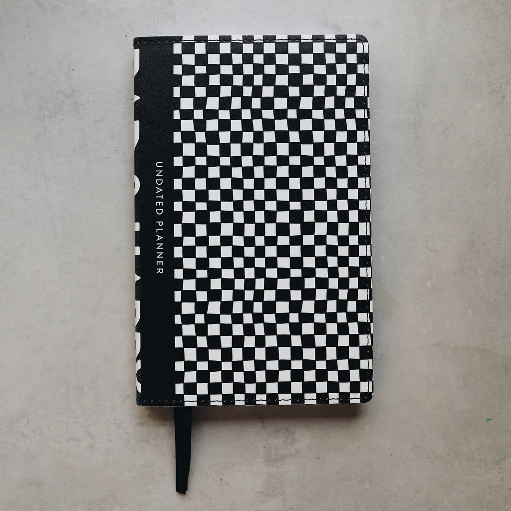 Undated Weekly Planner with a Wipeable Checkers Cover and Equal Space for Weekdays and Weekends