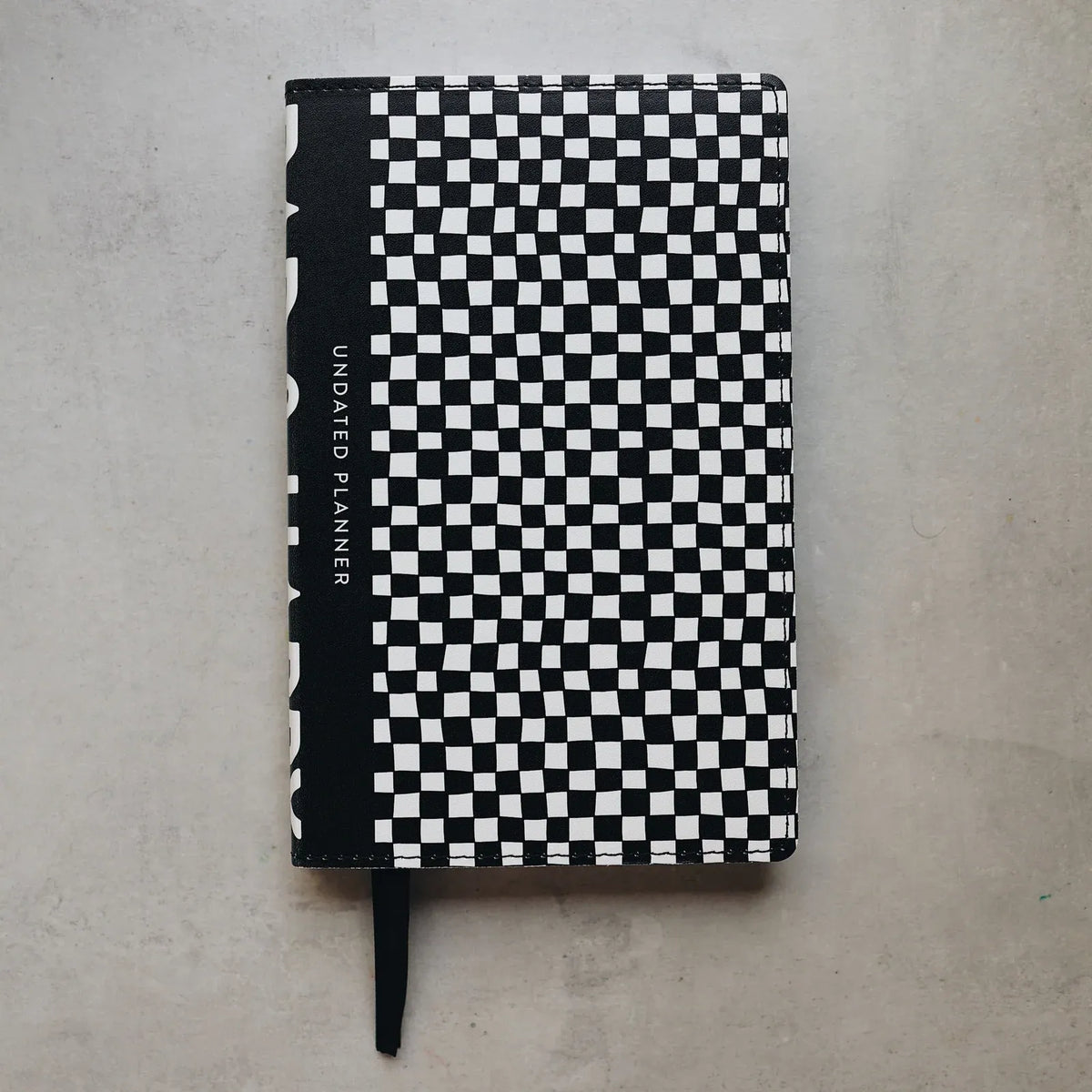 Undated Weekly Planner with a Wipeable Checkers Cover and Equal Space for Weekdays and Weekends