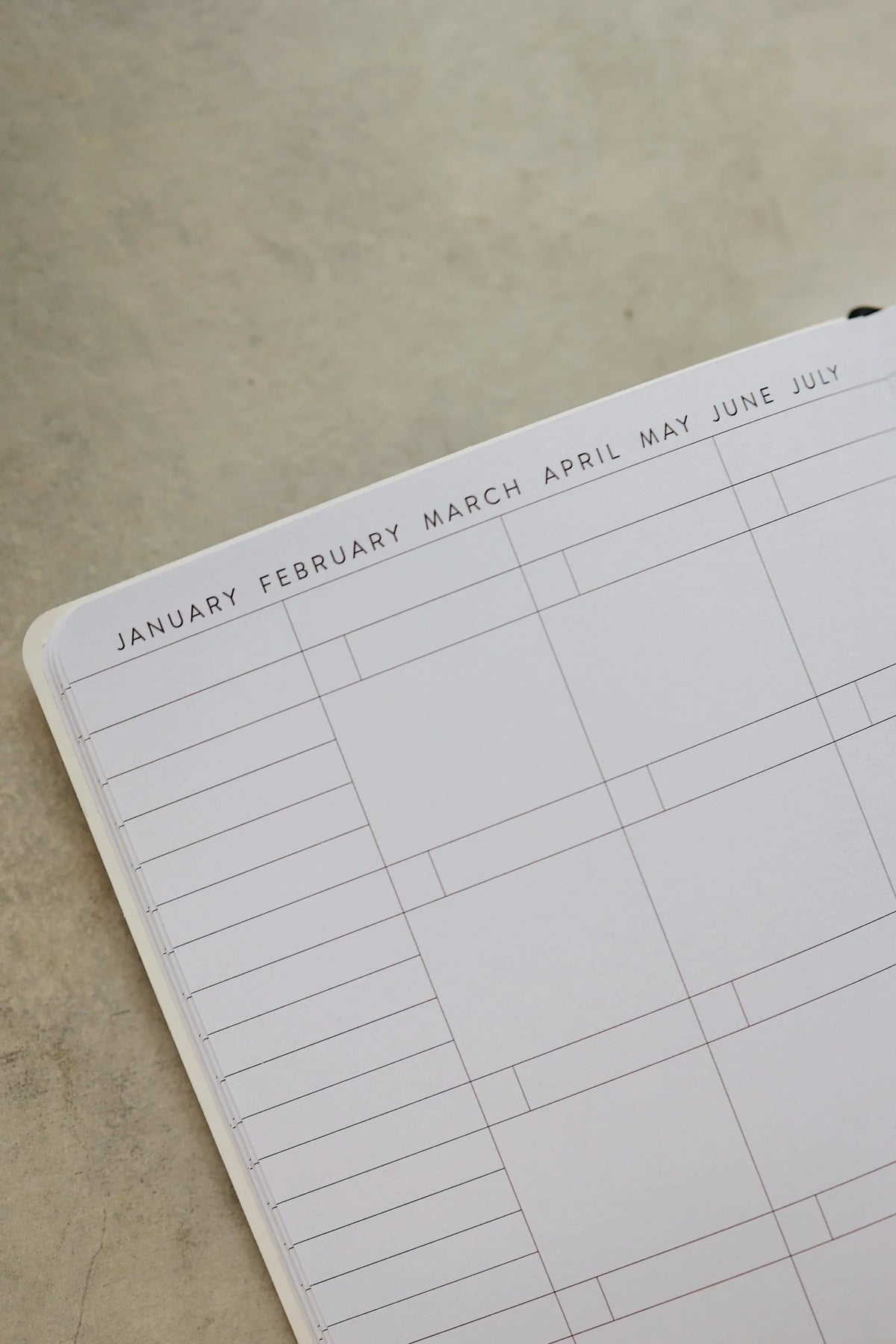 Undated Weekly Planner with a Wipeable Checkers Cover and Equal Space for Weekdays and Weekends