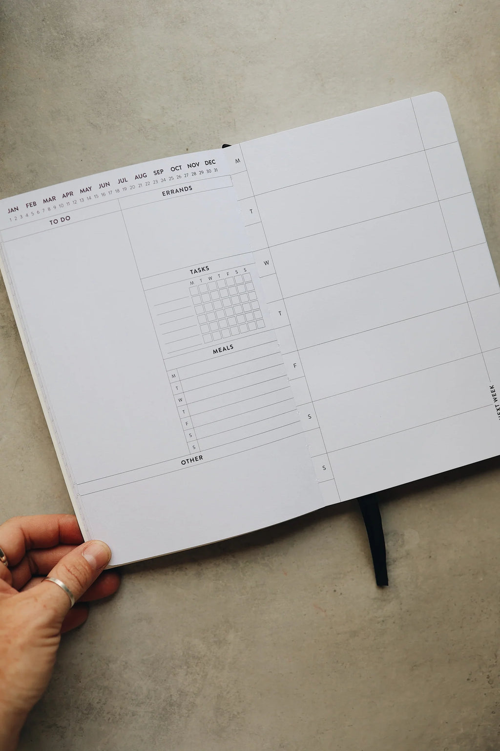 Undated Weekly Planner with a Wipeable Checkers Cover and Equal Space for Weekdays and Weekends