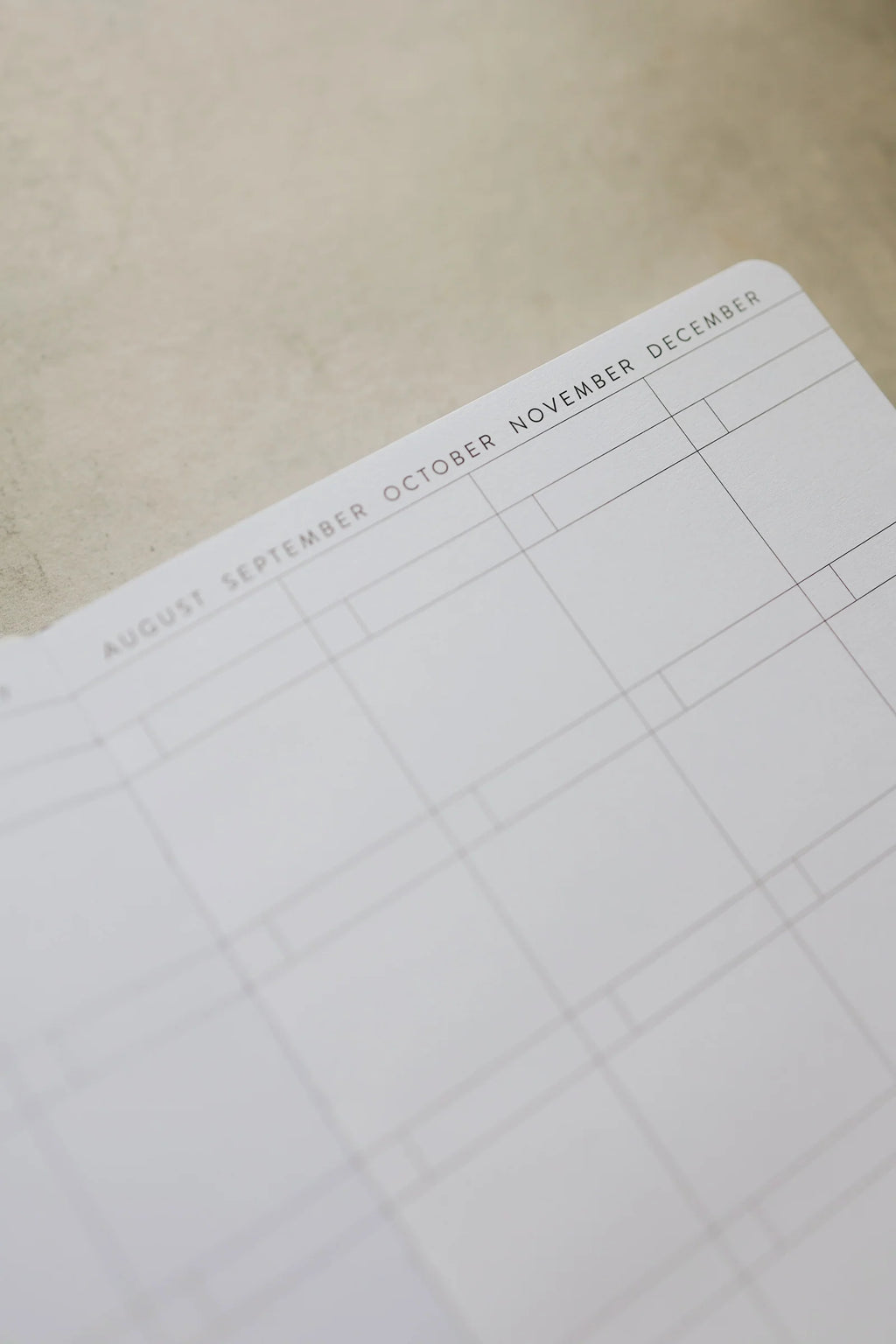 Undated Weekly Planner with a Wipeable Checkers Cover and Equal Space for Weekdays and Weekends