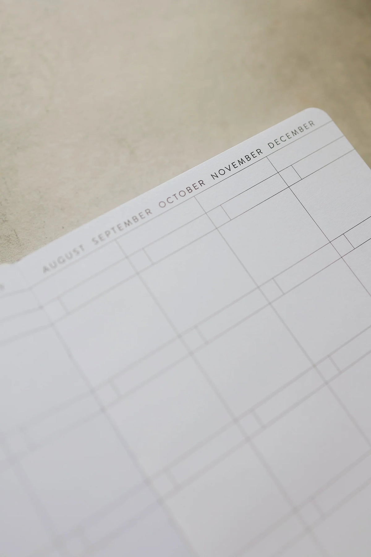 Undated Weekly Planner with a Wipeable Checkers Cover and Equal Space for Weekdays and Weekends
