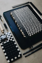Undated Weekly Planner with a Wipeable Checkers Cover and Equal Space for Weekdays and Weekends