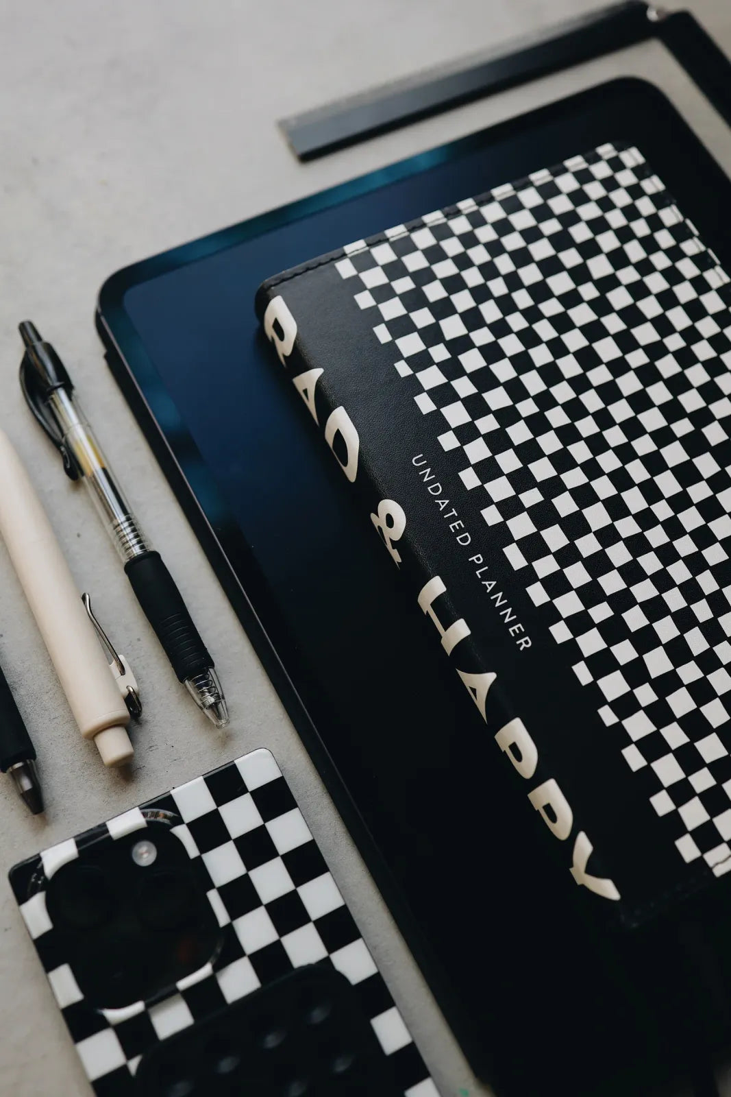 Undated Weekly Planner with a Wipeable Checkers Cover and Equal Space for Weekdays and Weekends
