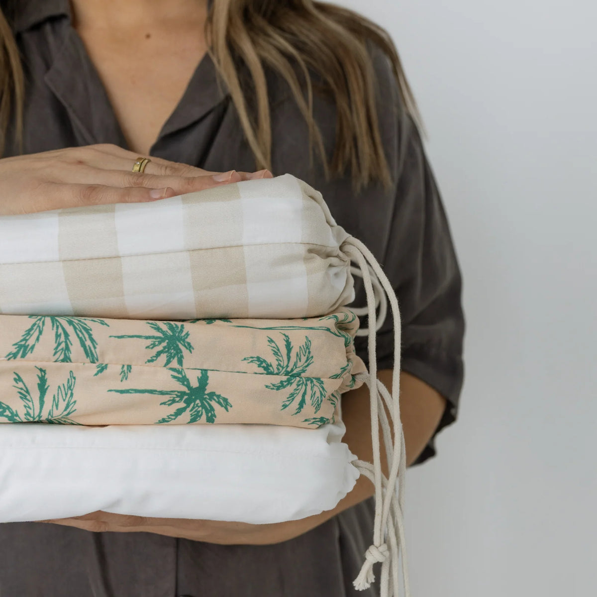 Waterproof Cot Sheet in Latte Brown Gingham with an Organic Cotton Face and Built-In Waterproof Lining