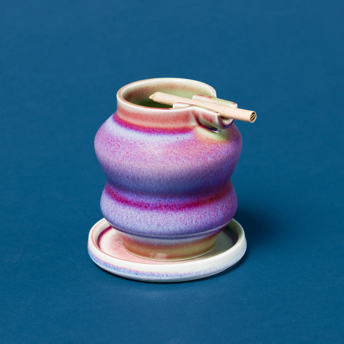 Wavy Outdoor Ashtray with Deep Well and Convenient Coaster for Patio or Smoking Areas · ash tray