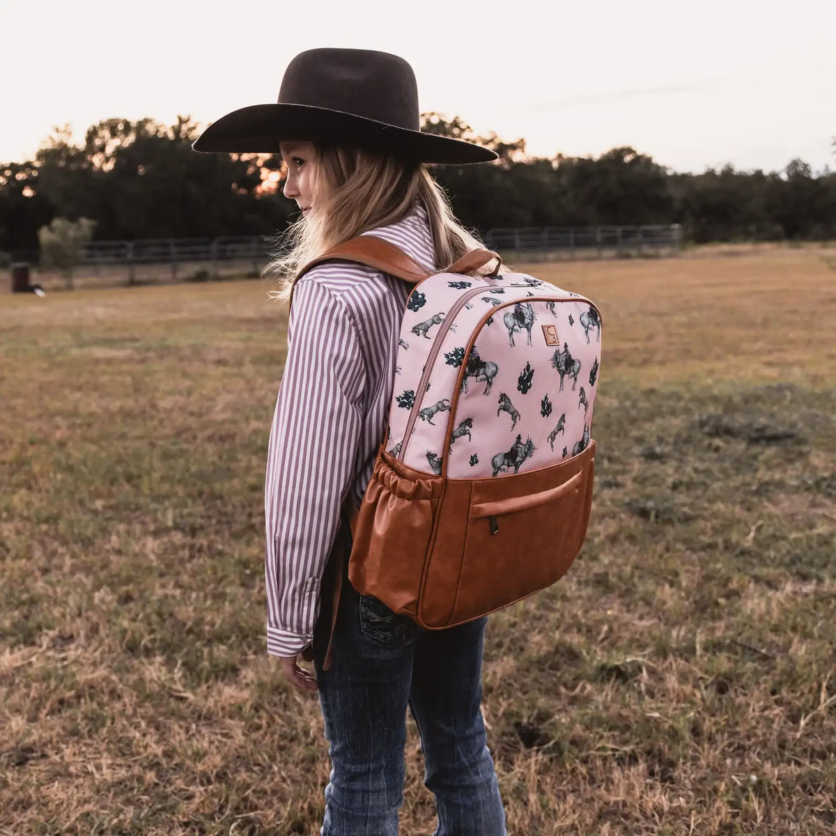 Western Unicorn Backpack for School and Diaper Bag Use with Bottle Pockets and a Lined Interior