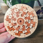 Wooden Math Puzzle in Cherry and Maple Hardwood, Featuring Five Rotating Rings and a Single Solution