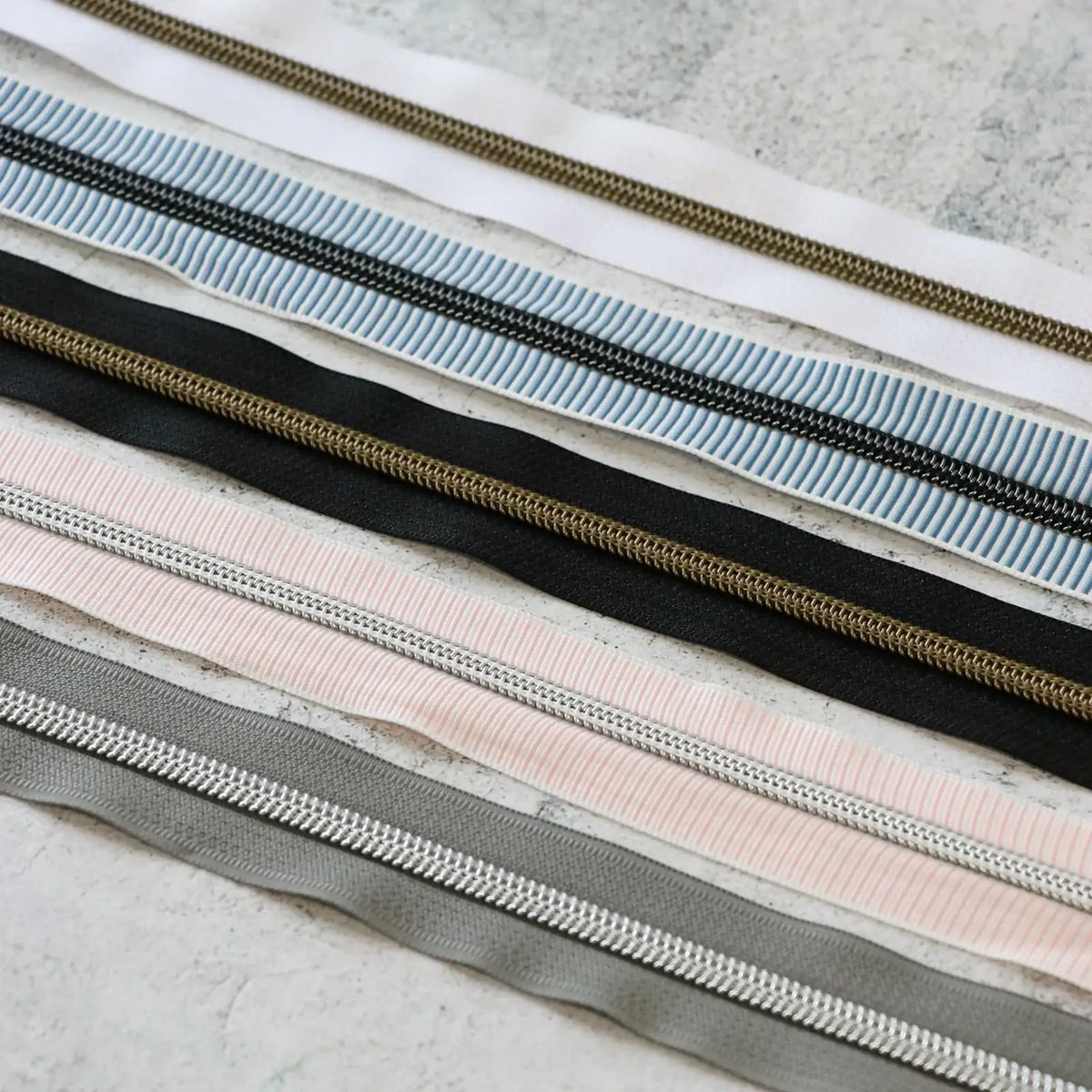 Zipper Bundle for Sewing and Bag Making in #5 Nylon Coil, Featuring Solid and Striped Color Combinations